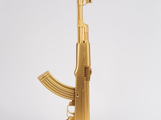 Philippe STARK pour Flos.  Lampe "Happiness is a hot gun" Etiquette de