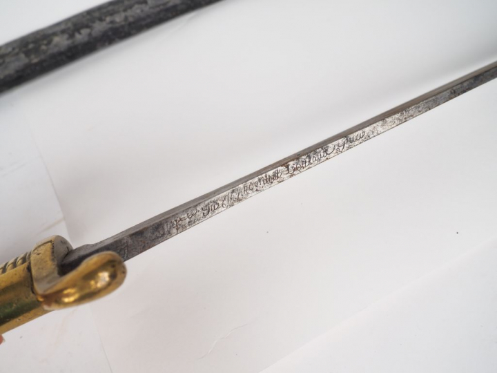 Sabre briquet modèle AN XI , fusée en bronze fondu, lame courbe et pla
