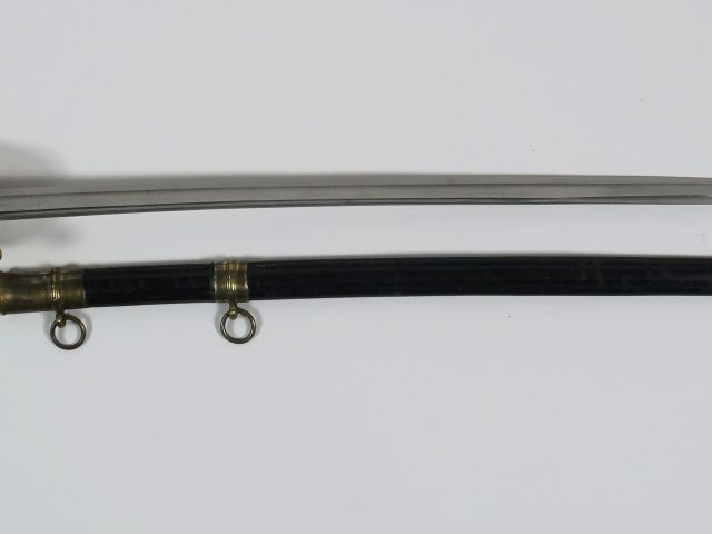 Sabre d’adjudant d’infanterie modèle 1845. Lame courbe à gorge et gout