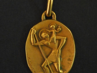 Vente aux enchères Médaille religieuse de style Art déco en or jaune, figurant Saint Jean