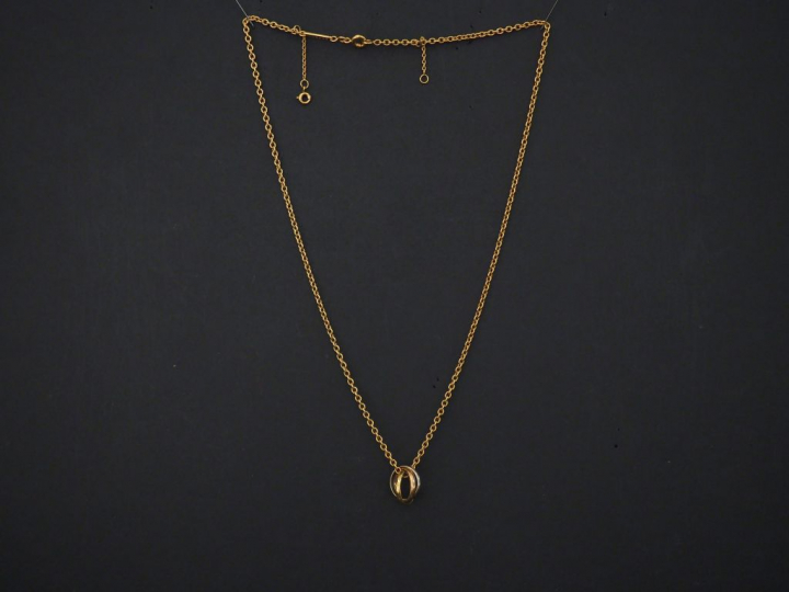 CARTIER, Trinity Collier en or jaune, maille forçat, et son pendentif 