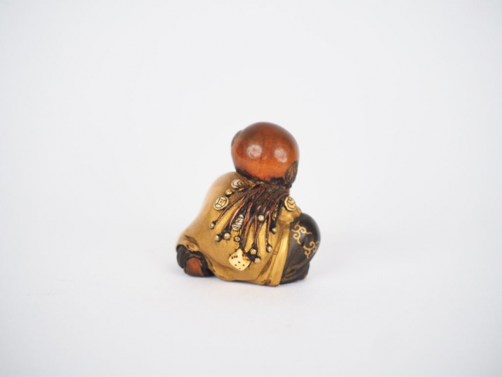Japon, période Meiji (1868-1912)  Ensemble comprenant un netsuke en bo