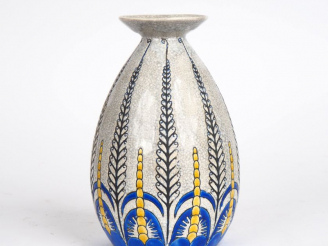 Vente aux enchères KERAMIS (attribué à). Vase ovoïde en faïence craquelée à décor polychr