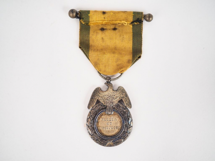 Rare médaille militaire 1er modèle (1852), module rond en argent avec 