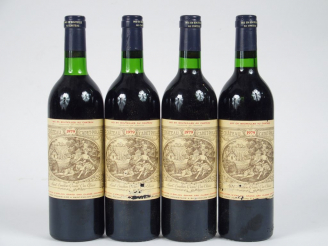 Vente aux enchères 4 BOUTEILLES CHÂTEAU CADET PIOLA ST EMILION GC - 1979 - 1 BG/2 ELA