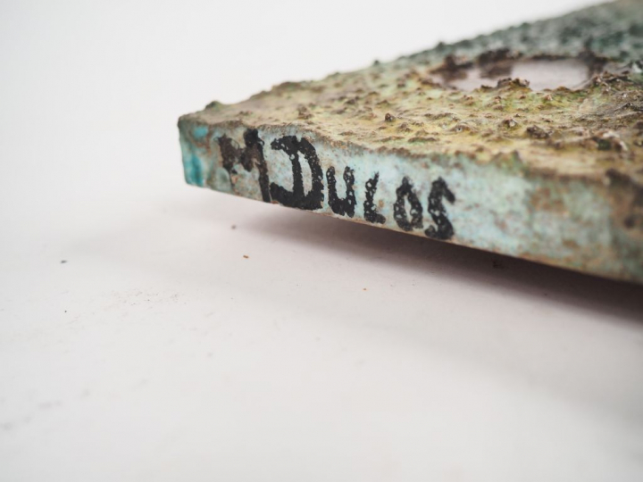 M. DUCOS. Deux différentes plaques en terre cuite émaillée polychrome,