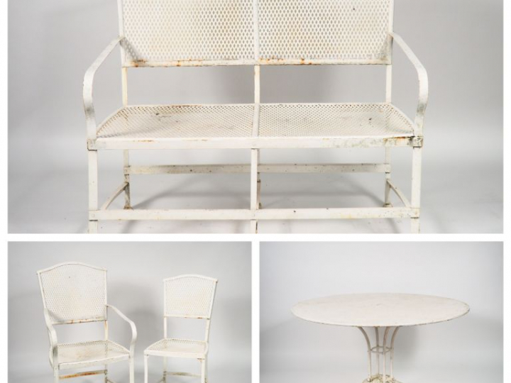 Salon de jardin en métal peint à décor ajouré de treillage, pieds grif