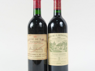 Vente aux enchères 2 BOUTEILLES : 1 CHÂTEAU CARBONNIEUX GCC GRAVES 1988 - 1 CHÂTEAU DE SA