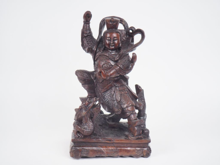 Chine, vers 1900,  Groupe en bois sculpté représentant un des quatre g