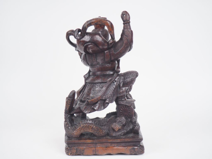Chine, vers 1900,  Groupe en bois sculpté représentant un des quatre g