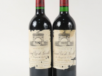 Vente aux enchères 2 BOUTEILLES CHÂTEAU LEOVILLE LAS CASES GCC ST JULIEN - 1983 - BG/1 EL
