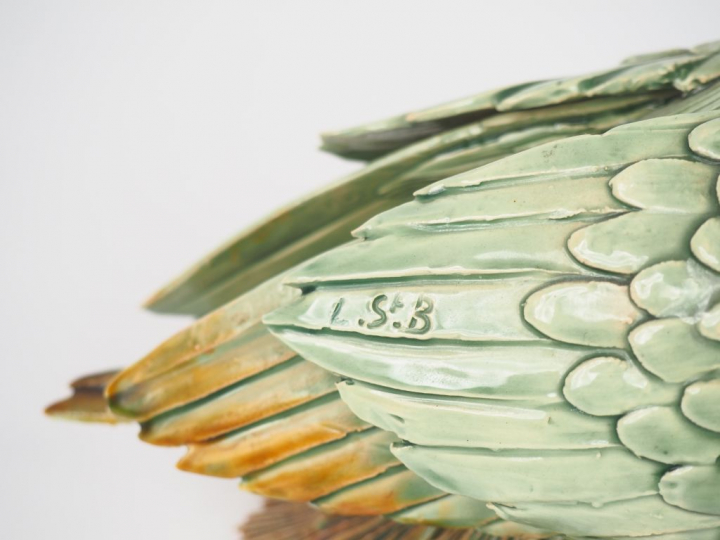 Sujet XXème en céramique polychrome, "Tourterelle". Signé L. SAINT B. 