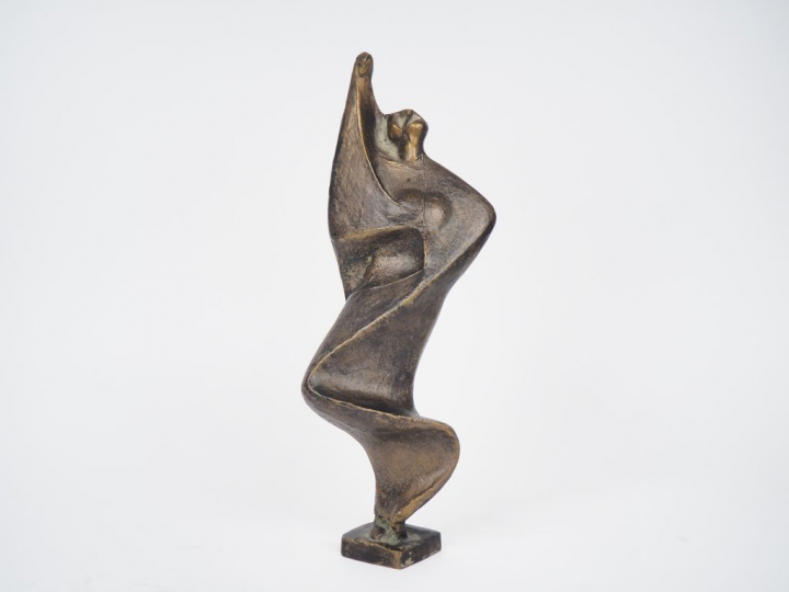 Ecole française XXème. "Personnage stylisé". Sujet en bronze. Signé H.