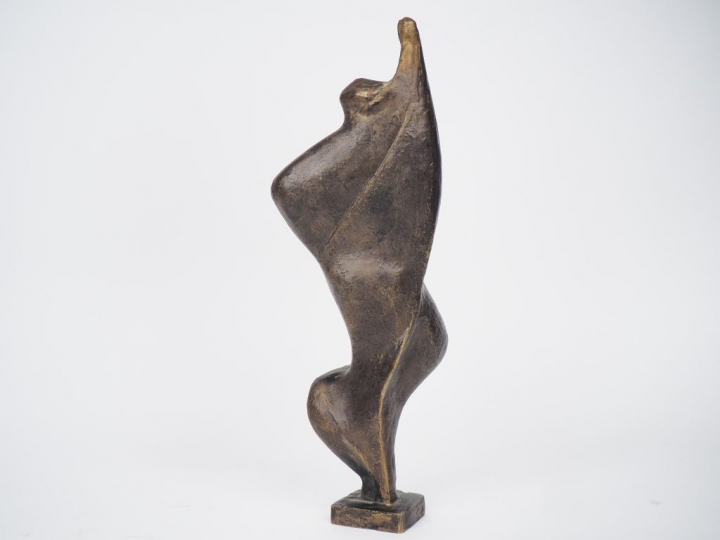 Ecole française XXème. "Personnage stylisé". Sujet en bronze. Signé H.