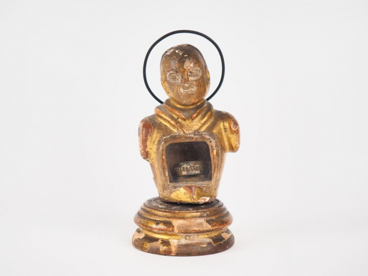 Reliquaire XVIIIème XIXème en bois sculpté et doré figurant une Saint 