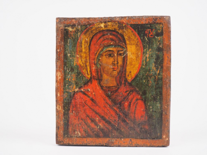 Icône Orthodoxe XIXème en bois polychrome figurant une Sainte nimbée. 