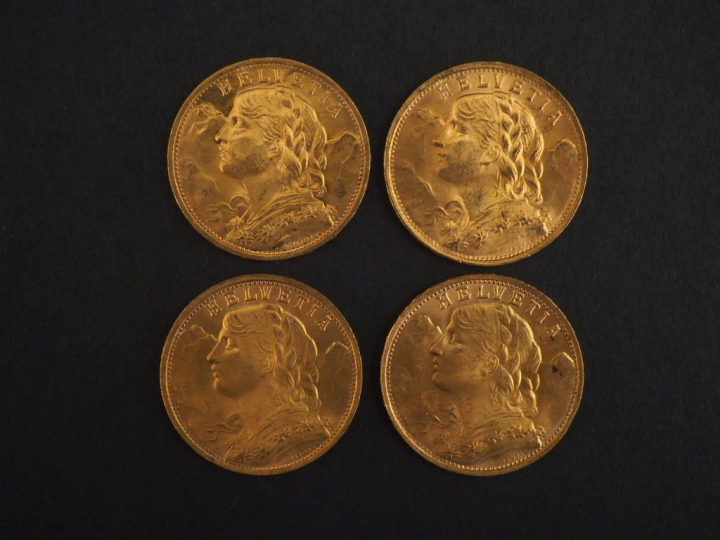 Quatre pièces de pièces de 20 Francs suisse or, 1930 et 1947 (x3).   