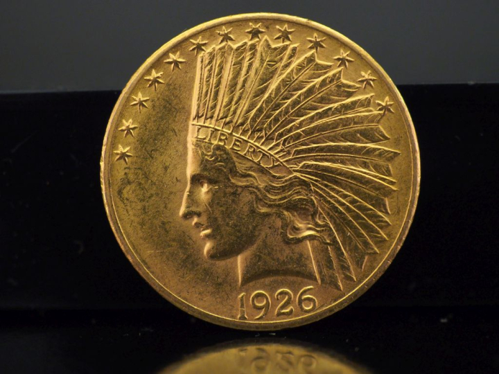 	Une pièce de 10 Dollars or, 1926.    FRAIS ACHETEURS 10% HT.