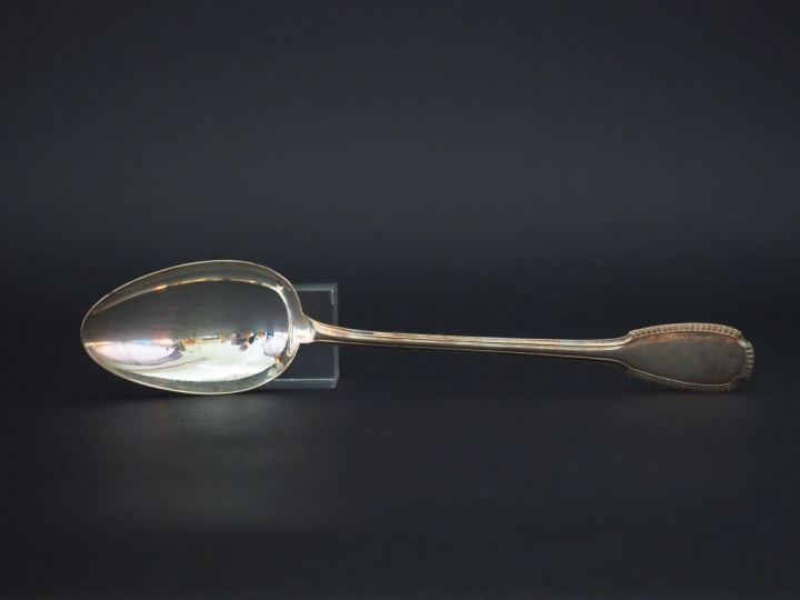 Cuillère à ragoût en argent, poinçon Minerve, à décor de godrons.  Lon
