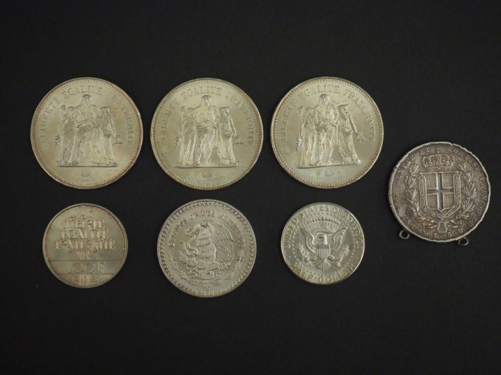 Ensemble comprenant :  - une pièce de 100 Francs en argent, 1986. - tr