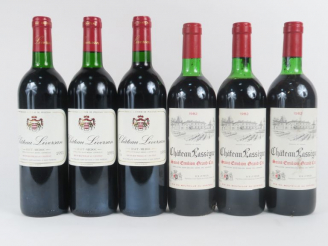 Vente aux enchères 6 BOUTEILLES : 3 CHÂTEAU LASSEGUE ST EMILION GC 1982 2 LB/1 HEP - 3 CH