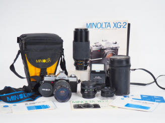 Vente aux enchères MINOLTA XG 2 n°1149491. Appareil photographique avec objectif MINOLTA 