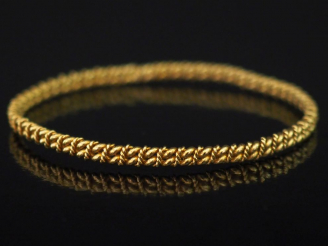 Vente aux enchères Bracelet jonc en or jaune, maille torsadée.  Diam. 6 cm Poids. 14,72 g