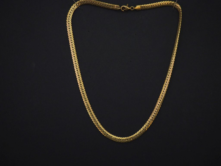 Collier souple en or jaune, maille anglaise.  Long. 43 cm Poids. 11,72