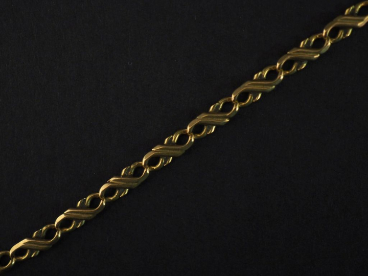 Bracelet souple en or jaune, maille fantaisie ajourée.  Long. 21 cm Po