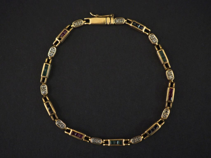 Bracelet articulé en or jaune 14k, composé de maillons sertis de petit