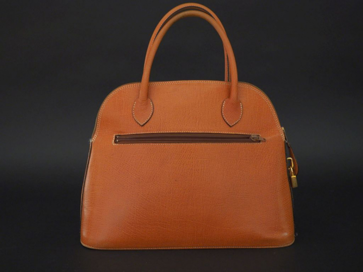 POURCHET, Paris Sac à main en cuir marron.  Ouverture à zip, bandouliè