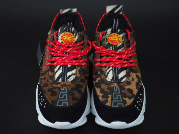 VERSACE,  Paire de sneakers, modèle "Chain Reaction".  T. 44 Signées. 