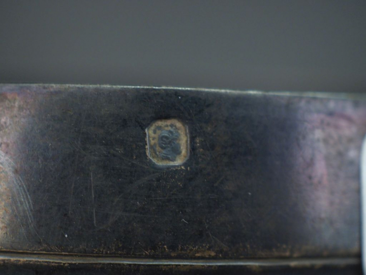 Tasse et sa sous-tasse en argent 925, poinçon Minerve, à décor de cann