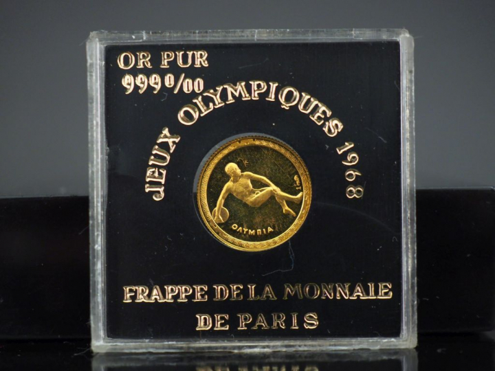 Ensemble comprenant deux médailles commémoratives des Jeux Olymiques d