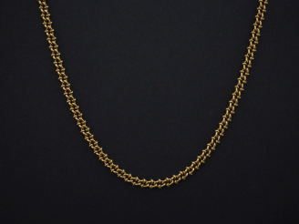 Vente aux enchères Sautoir en or jaune 750, maille fantaisie. Long. 64,5 cm Poids. 23,95 