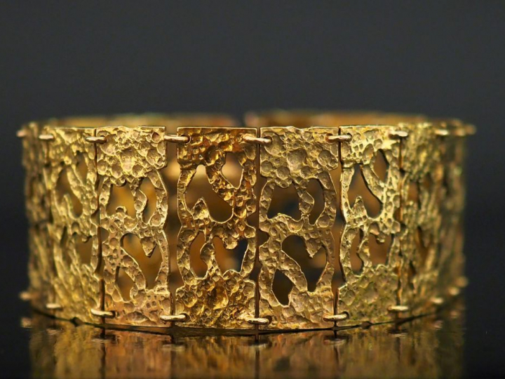 Bracelet articulé en or jaune 750, composé de maillons rectangulaires 
