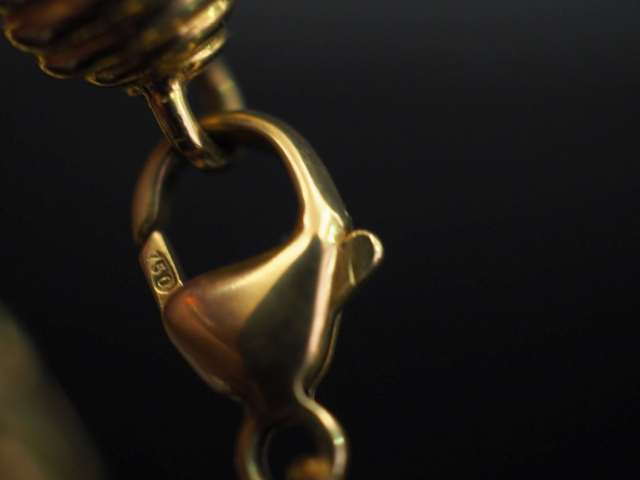 Bracelet articulé en or jaune 750, maille palmier.  Long. 19,5 cm Poid