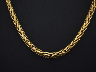 Vente aux enchères Collier souple en or jaune 750, maille palmier en chute.  Long. 42,5 c