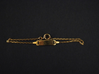 Vente aux enchères Bracelet de naissance en or jaune750. Long. 13 cm Poids. 1,40 g   