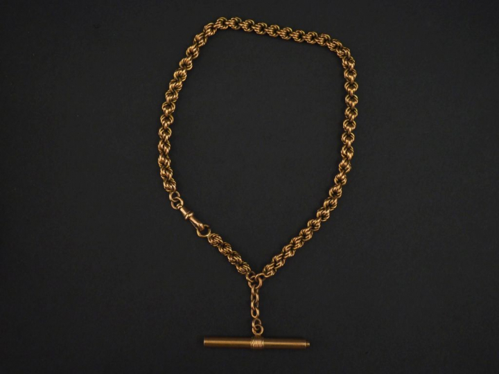 Giletière Napoléon III en or jaune, maille ronde tressée. Poids tel. 3
