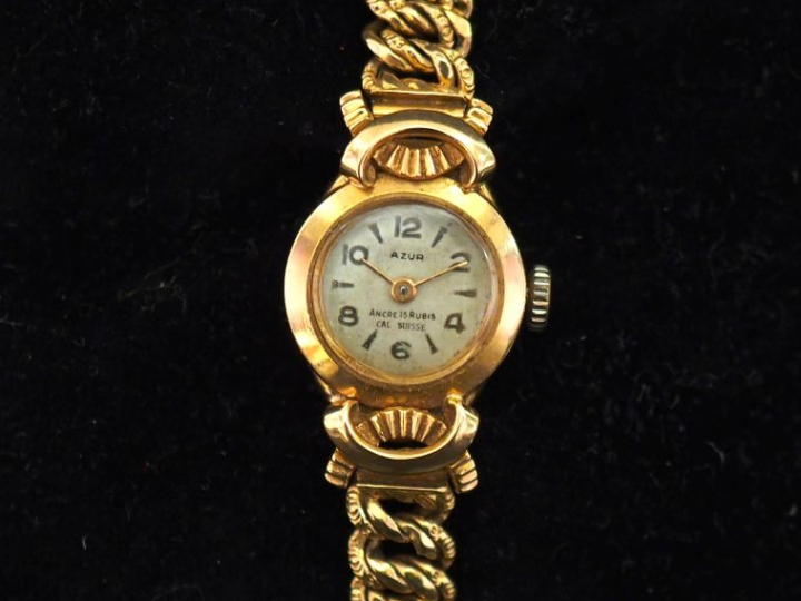 AZUR Montre bracelet de dame, boitier et bracelet en or jaune 750. Cad