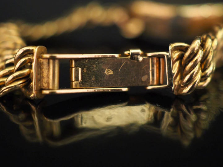 AZUR Montre bracelet de dame, boitier et bracelet en or jaune 750. Cad