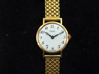 Vente aux enchères A. BARTHELAY Montre bracelet de dame, boitier et bracelet en or jaune 