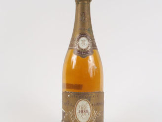 Vente aux enchères 1 BOUTEILLE CHAMPAGNE CRISTAL ROEDERER - 1988 - EA/COULEUR TROUBLE