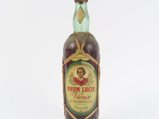 Vente aux enchères 1 TRÈS VIEILLE BOUTEILLE (1 L) RHUM VIEUX LUCIE H. DESBORDES