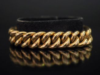 Vente aux enchères Bracelet souple en or jaune 750, maille gourmette.  Chainette de sécur