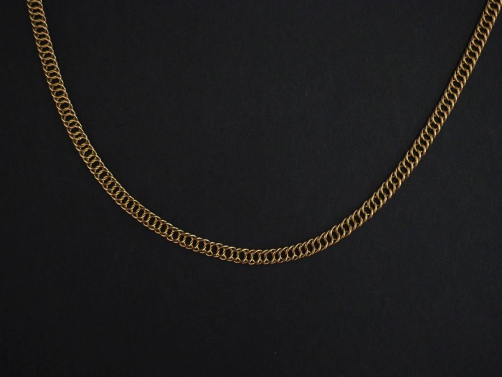 Collier en or jaune 750, maille fantaisie.  Long. 69 cm Poids. 15,34 g