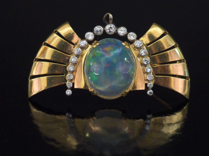Broche porte-montre ajourée de style 1940 en or jaune 750 et platine 9
