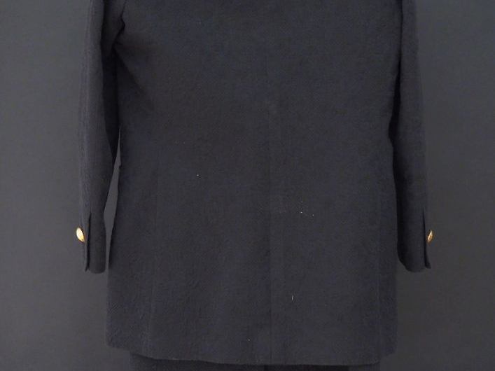 YVES SAINT LAURENT  Tailleur jupe noir en coton (98%) et polyamide (8%