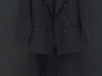 Vente aux enchères YVES SAINT LAURENT, Rive gauche Ensemble de tailleur à rayures en lain